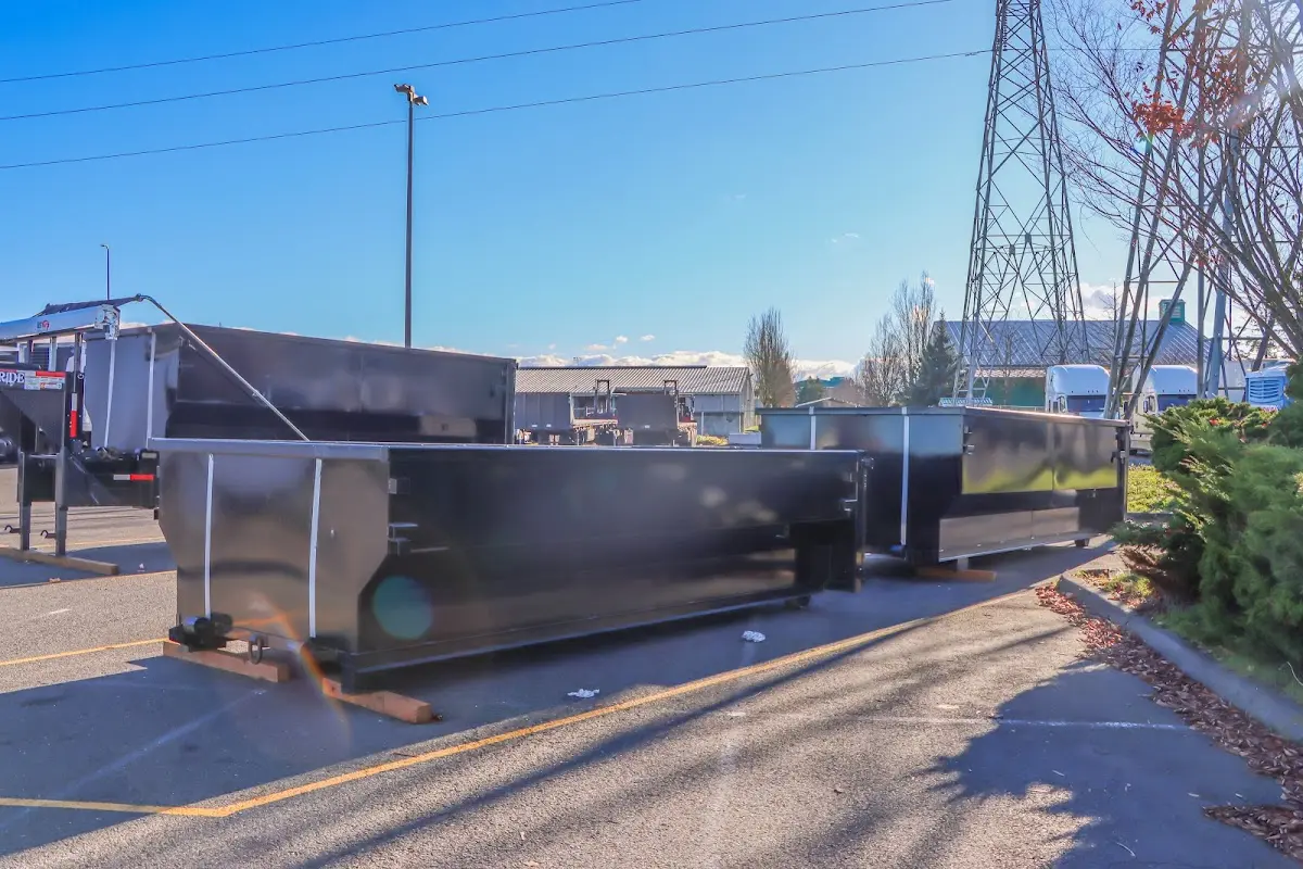 Roll-off dumpster ready for waste disposal at job site for 12 Yard Dumpster Rental in Clanton